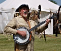 Buffalo Bill playing the banjo and singing