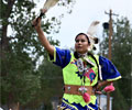 Wind River Indian dancer in a jangle dress