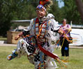 young boy Wind River Indian dancer doing the Men's Grass Dance