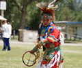 young boy Wind River Indian dancer doing the Men's Grass Dance