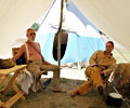 Mountain men relaxing in their tent at the Fort Laramie Rendezvous