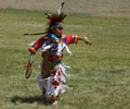 Young Wind River Indian dancer doing the Grass Dance