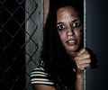beautiful girl escapes from cage at Morbid Nights Haunted House