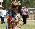 young boy Wind River Indian dancer doing the Men's Grass Dance