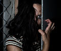 beautiful girl escapes from cage at Morbid Nights Haunted House