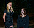 Zombie cop and mini-ghoul at the Fort Collins Zombie Crawl