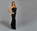 model Stacy DeHart posing in evening wear
